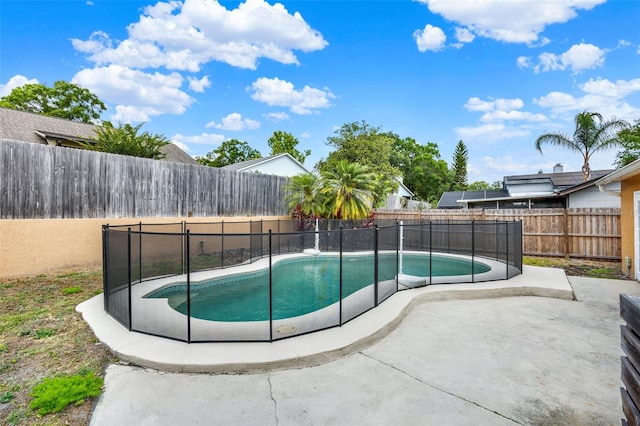 1050 Dees Dr, Oviedo, FL 32765 - view of swimming pool with a patio and a fenced backyard