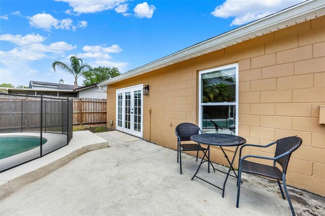 1050 Dees Dr, Oviedo, FL 32765 - view of patio with fence and french doors