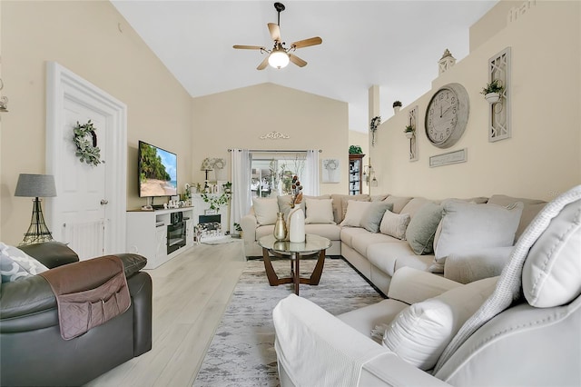 906 Elm Forest Dr, Minneola, FL 34715 - living room featuring ceiling fan, light wood finished floors, and high vaulted ceiling