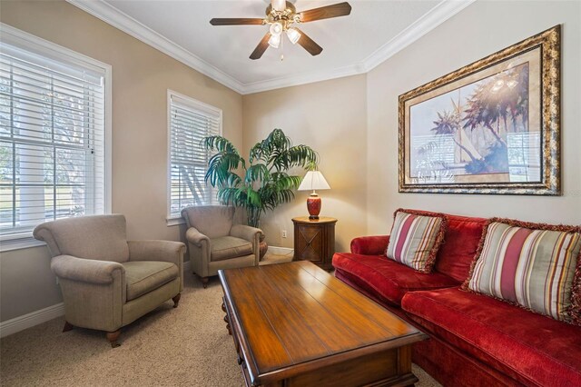 7550 Gathering Dr, Reunion, FL 34747 - living room with crown molding, a ceiling fan, baseboards, and light colored carpet