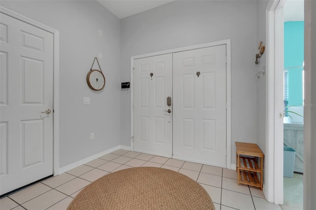 4796 Cumbrian Lakes Dr, Kissimmee, FL 34746 - entrance foyer featuring light tile patterned floors and baseboards