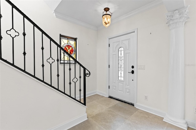 1047 Banks Rose St, Kissimmee, FL 34747 - foyer featuring decorative columns, stairway, crown molding, and baseboards