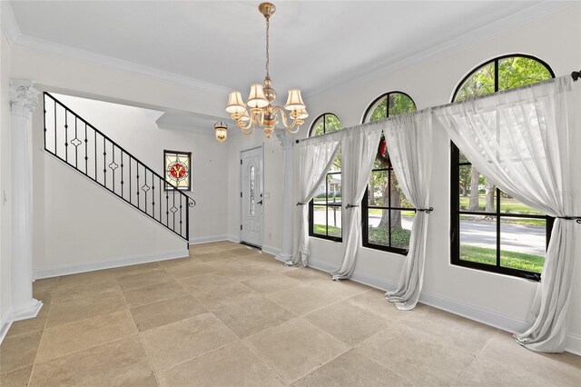 1047 Banks Rose St, Kissimmee, FL 34747 - entryway with a chandelier, ornamental molding, baseboards, and healthy amount of natural light