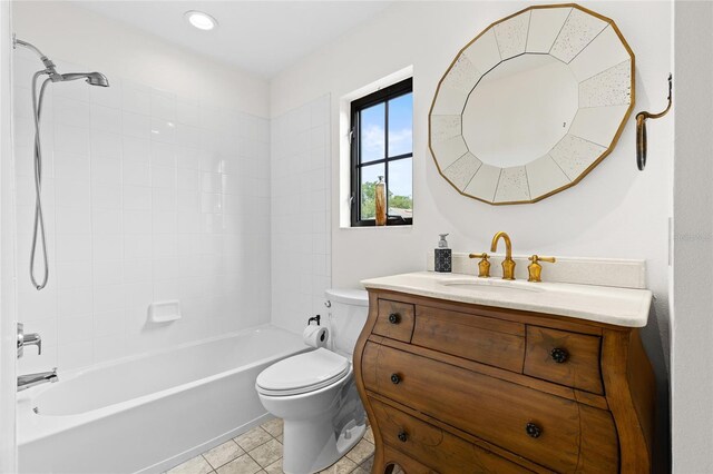 1047 Banks Rose St, Kissimmee, FL 34747 - bathroom featuring toilet, vanity, tile patterned flooring, and bathtub / shower combination