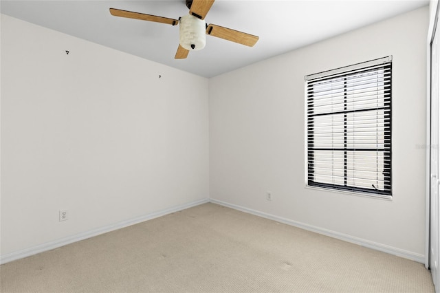 1047 Banks Rose St, Kissimmee, FL 34747 - empty room with light colored carpet, baseboards, and a ceiling fan