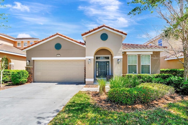 4416 Acorn Ct, Davenport, FL 33837 - mediterranean / spanish house featuring an attached garage, driveway, stucco siding, and a tiled roof