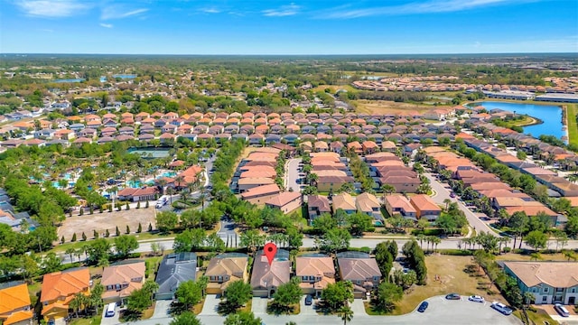 4416 Acorn Ct, Davenport, FL 33837 - aerial view of property's location featuring nearby suburban area and a nearby body of water