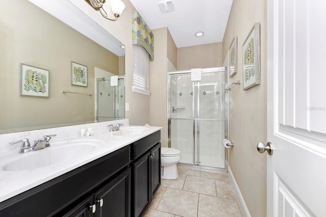4416 Acorn Ct, Davenport, FL 33837 - full bathroom with a shower stall, tile patterned floors, double vanity, toilet, and baseboards