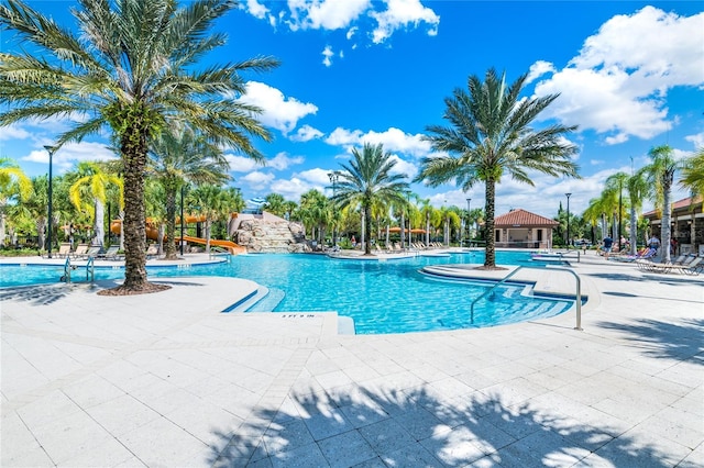 4416 Acorn Ct, Davenport, FL 33837 - community pool featuring a patio area