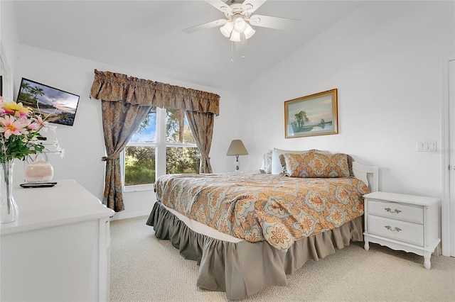 2473 Saint Augustine Blvd, Haines City, FL 33844 - bedroom featuring light colored carpet, vaulted ceiling, ceiling fan, and baseboards