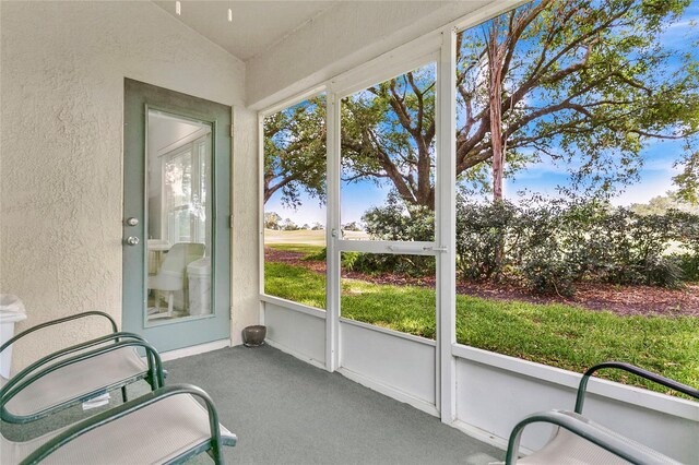 2473 Saint Augustine Blvd, Haines City, FL 33844 - unfurnished sunroom featuring vaulted ceiling