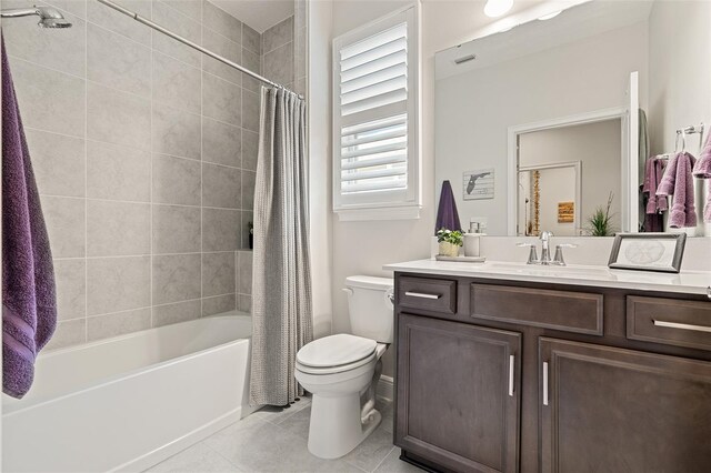 3428 Sagebrush St, Saint Cloud, FL 34773 - full bath with vanity, toilet, tile patterned floors, and shower / tub combo with curtain