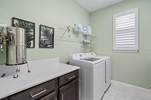 3428 Sagebrush St, Saint Cloud, FL 34773 - laundry room with independent washer and dryer, baseboards, light tile patterned floors, and cabinet space