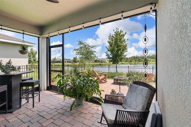 3428 Sagebrush St, Saint Cloud, FL 34773 - sunroom / solarium with a water view and ceiling fan