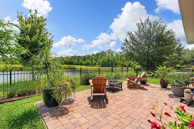 3428 Sagebrush St, Saint Cloud, FL 34773 - fenced backyard with a patio area and a water view