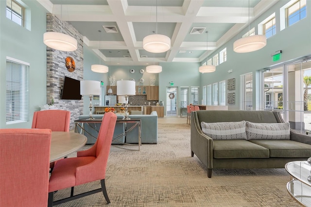 3428 Sagebrush St, Saint Cloud, FL 34773 - building lobby featuring a high ceiling, coffered ceiling, and beam ceiling
