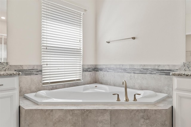 3138 Dark Sky Dr, Saint Cloud, FL 34773 - full bath with vanity and a garden tub