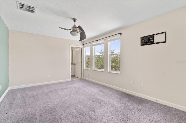 3138 Dark Sky Dr, Saint Cloud, FL 34773 - carpeted spare room featuring a ceiling fan, baseboards, and a textured ceiling
