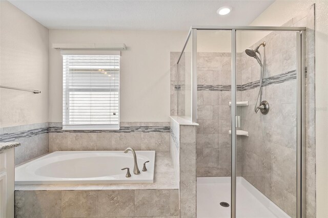 3138 Dark Sky Dr, Saint Cloud, FL 34773 - bathroom with a shower stall and a garden tub