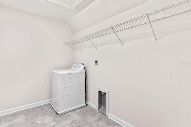 3138 Dark Sky Dr, Saint Cloud, FL 34773 - laundry room featuring washer / dryer, baseboards, and light tile patterned flooring