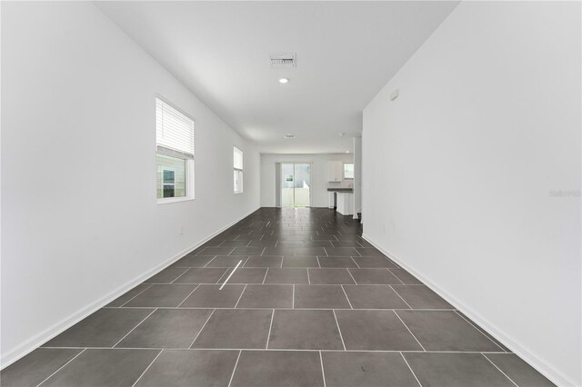 7728 Stone Creek Trl, Kissimmee, FL 34747 - corridor featuring recessed lighting and baseboards
