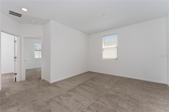 7728 Stone Creek Trl, Kissimmee, FL 34747 - carpeted empty room featuring baseboards