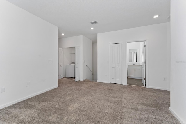 7728 Stone Creek Trl, Kissimmee, FL 34747 - unfurnished bedroom featuring washer / dryer, carpet flooring, baseboards, and recessed lighting