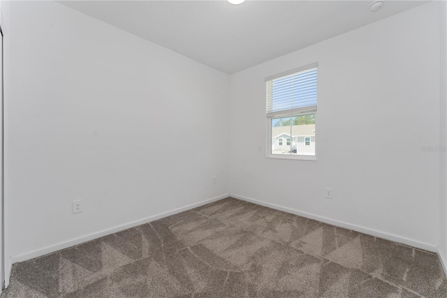 7728 Stone Creek Trl, Kissimmee, FL 34747 - carpeted spare room featuring baseboards