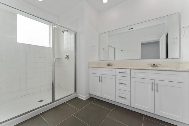 7728 Stone Creek Trl, Kissimmee, FL 34747 - bathroom with a shower stall, tile patterned flooring, and double vanity