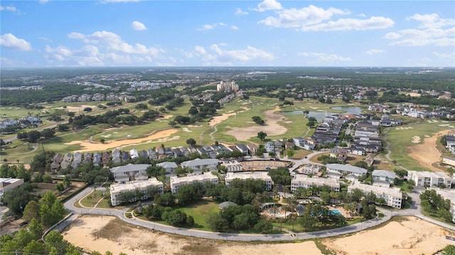 7509 Mourning Dove Cir Unit 303, Reunion, FL 34747 - aerial view of property and surrounding area featuring a nearby body of water, a golf club, and nearby suburban area