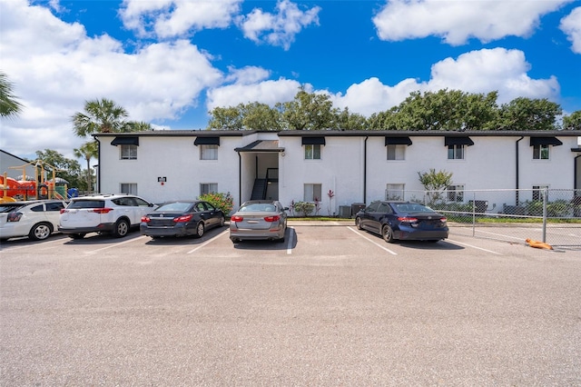 4403 S Semoran Blvd Unit 2, Orlando, FL 32822 - multi unit property with uncovered parking, fence, and stucco siding