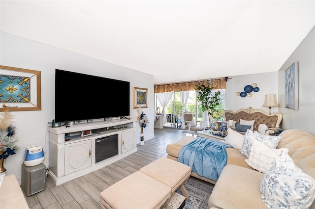4403 S Semoran Blvd Unit 2, Orlando, FL 32822 - living area with wood finish floors and baseboards