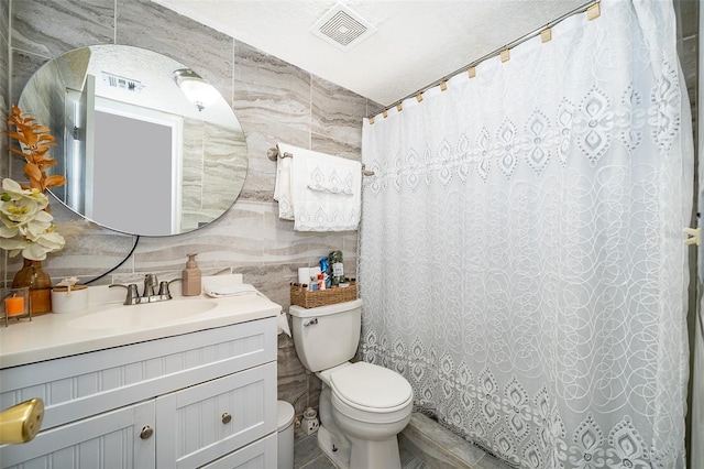 4403 S Semoran Blvd Unit 2, Orlando, FL 32822 - full bath with toilet, vanity, tile walls, and a shower with shower curtain