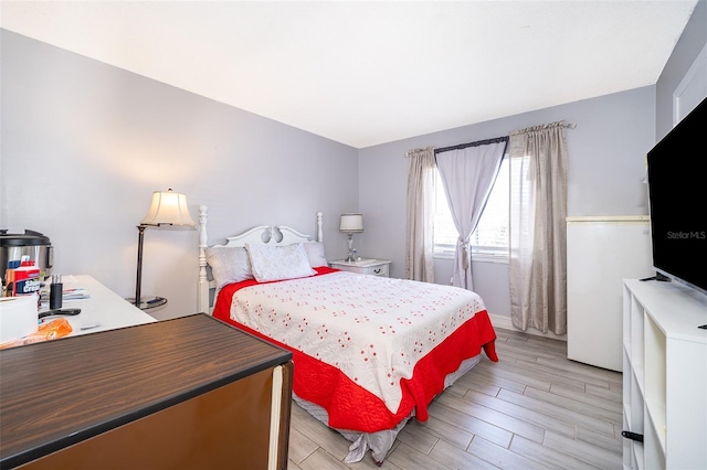 4403 S Semoran Blvd Unit 2, Orlando, FL 32822 - bedroom featuring light wood-type flooring and an office area