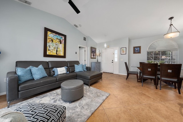 402 Ohio Way, Kissimmee, FL 34759 - living area with vaulted ceiling, light tile patterned flooring, a ceiling fan, and baseboards