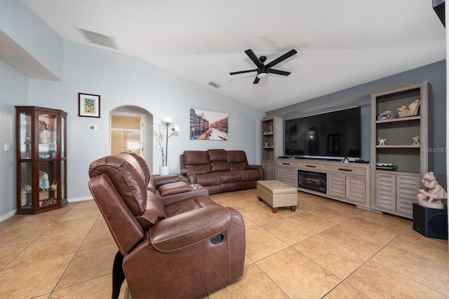 402 Ohio Way, Kissimmee, FL 34759 - living area with lofted ceiling, arched walkways, light tile patterned flooring, and ceiling fan