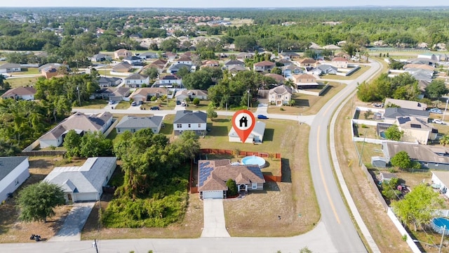 402 Ohio Way, Kissimmee, FL 34759 - aerial perspective of suburban area featuring a heavily wooded area