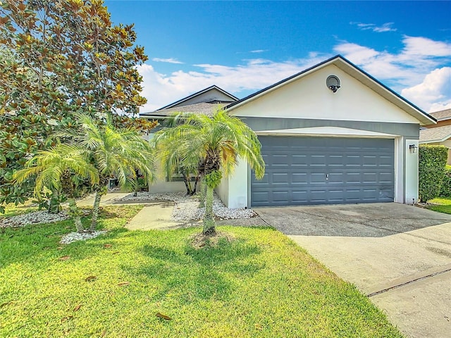 550 Canary Island Cir, Davenport, FL 33837 - single story home with driveway, a front yard, and stucco siding