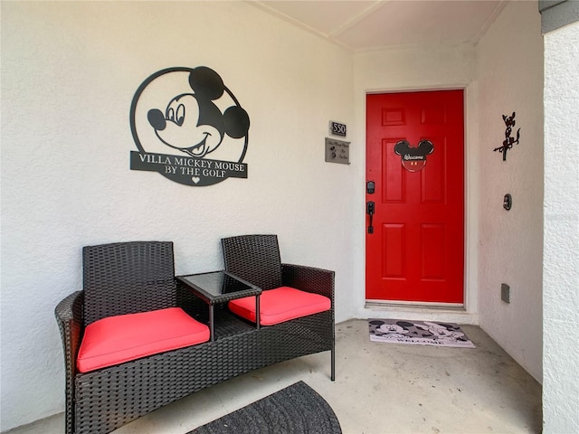 550 Canary Island Cir, Davenport, FL 33837 - doorway to property featuring stucco siding