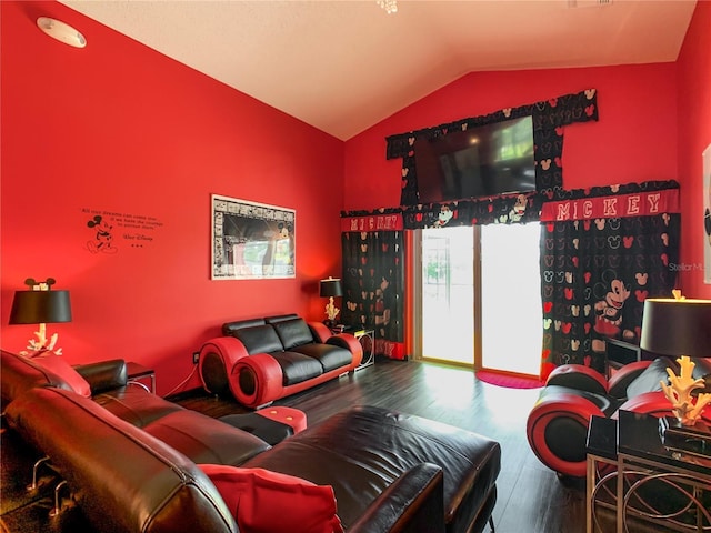 550 Canary Island Cir, Davenport, FL 33837 - living room featuring vaulted ceiling and wood finished floors