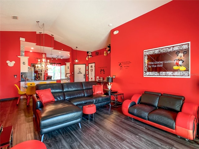550 Canary Island Cir, Davenport, FL 33837 - living room featuring wood finished floors and vaulted ceiling
