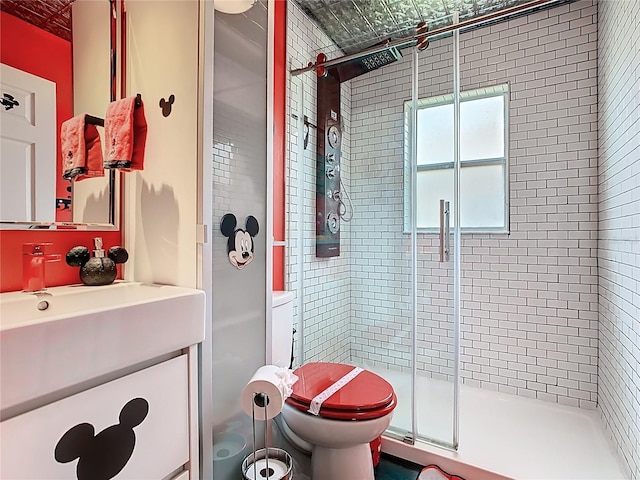 550 Canary Island Cir, Davenport, FL 33837 - full bath with a shower stall, vanity, and toilet