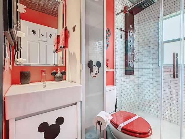 550 Canary Island Cir, Davenport, FL 33837 - full bath featuring a shower stall, vanity, and toilet