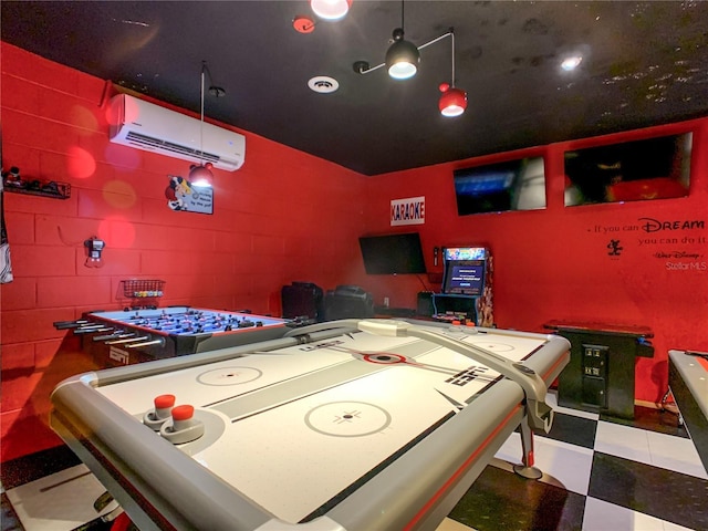 550 Canary Island Cir, Davenport, FL 33837 - game room with a wall mounted air conditioner, tile patterned floors, and concrete block wall