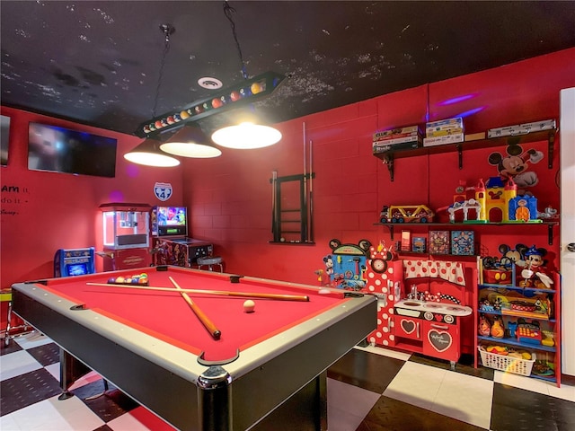 550 Canary Island Cir, Davenport, FL 33837 - playroom with tile patterned floors, pool table, and concrete block wall