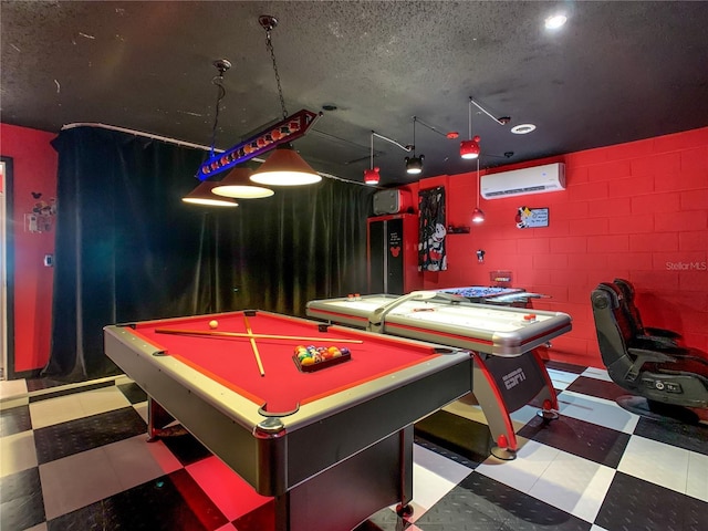 550 Canary Island Cir, Davenport, FL 33837 - game room with tile patterned floors, an AC wall unit, concrete block wall, billiards, and a textured ceiling