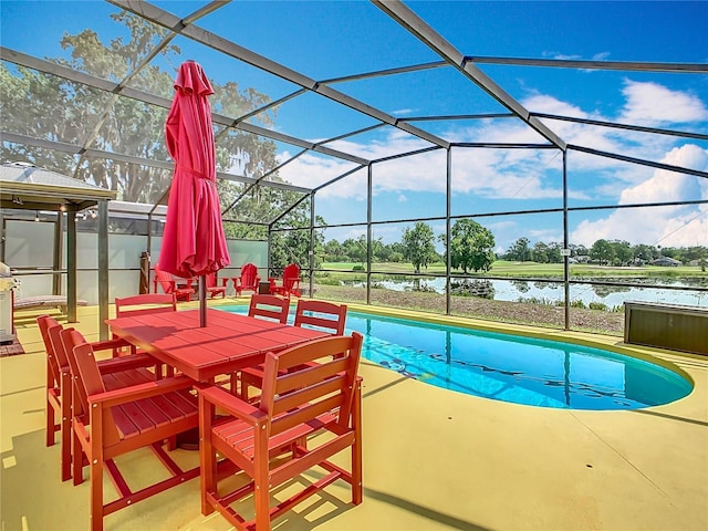 550 Canary Island Cir, Davenport, FL 33837 - outdoor pool featuring a water view, a patio area, and glass enclosure