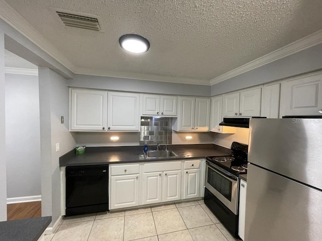 kitchen with stainless steel appliances, a sink, dark countertops, a textured ceiling, and ornamental molding