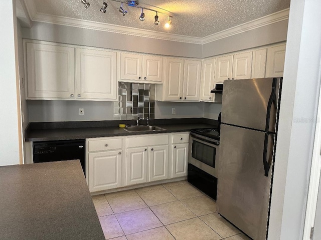kitchen featuring stainless steel appliances, a sink, a textured ceiling, dark countertops, and white cabinetry