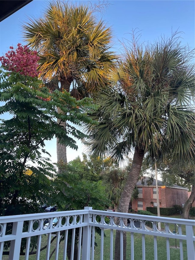view of yard with a balcony